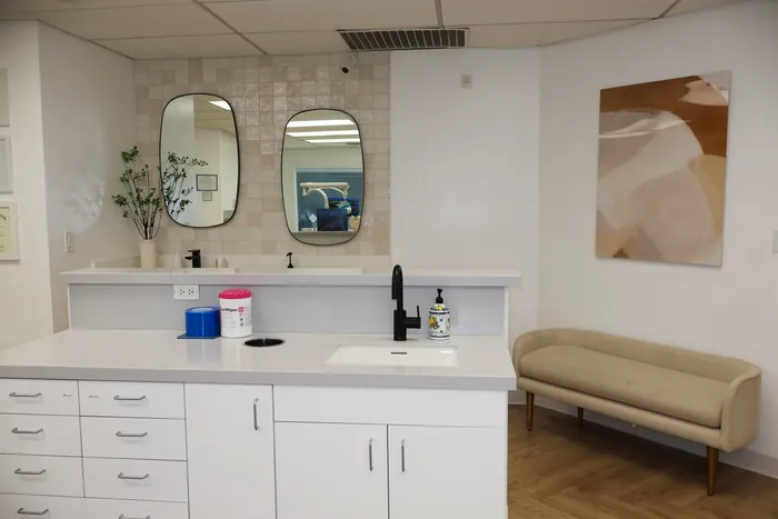 Berger Orthodontics office island with warm abstract painting